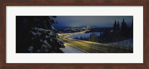 Framed Winding road running through a snow covered landscape, Anchorage, Alaska, USA Print