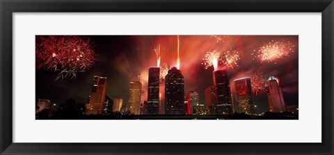 Framed Fireworks over buildings in a city, Houston, Texas Print