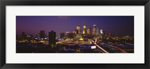 Framed Skyscrapers lit up at dusk, Minneapolis, Minnesota, USA Print