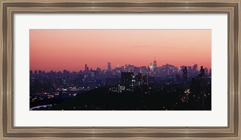 Framed High angle view of buildings lit up at dusk, Manhattan, New York City, New York State, USA Print
