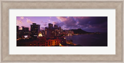 Framed Buildings lit up at dusk, Waikiki, Oahu, Hawaii, USA Print