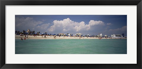 Framed Tourists on the beach, Miami, Florida, USA Print