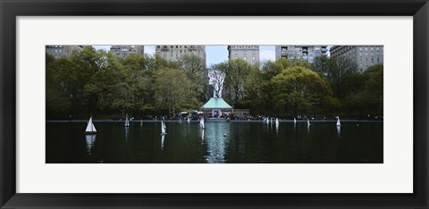 Framed Toy boats floating on water, Central Park, Manhattan Print