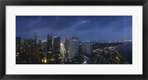 Framed High angle view of buildings in a city lit up at night, New Orleans, Louisiana, USA Print