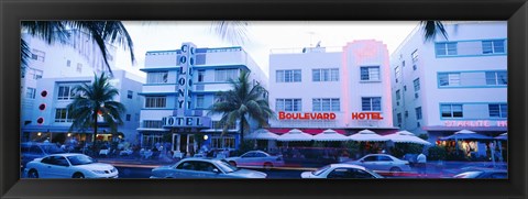 Framed Traffic on road in front of hotels, Ocean Drive, Miami, Florida, USA Print