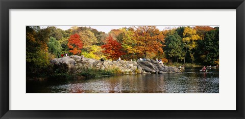 Framed Group of people sitting on rocks, Central Park, Manhattan, New York City, New York, USA Print