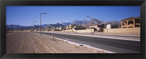 Framed Houses in a row along a road, Las Vegas, Nevada, USA Print