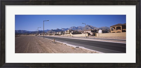 Framed Houses in a row along a road, Las Vegas, Nevada, USA Print