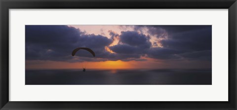 Framed Silhouette of a person paragliding over the sea, Blacks Beach, San Diego, California, USA Print