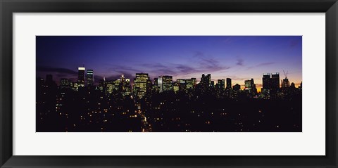 Framed Skyscrapers in a city lit up at night, Manhattan, New York City, New York State, USA Print