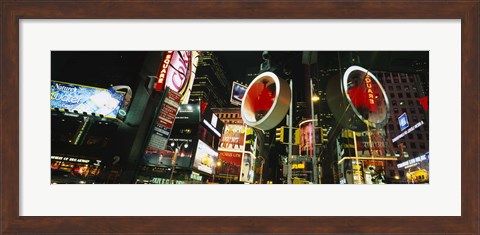 Framed Low angle view of buildings lit up at night, Times Square, Manhattan, New York City, New York State, USA Print