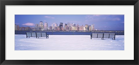 Framed Park benches in snow with a city in the background, Lower Manhattan, Manhattan, New York City, New York State, USA Print