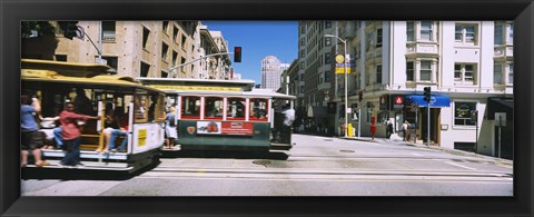 Framed Two cable cars on a road, Downtown, San Francisco, California, USA Print