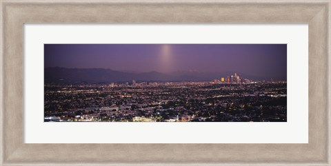 Framed Buildings in a city lit up at dusk, Hollywood, San Gabriel Mountains, City Of Los Angeles, Los Angeles County, California, USA Print