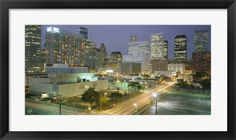 Framed Skyscrapers lit up at night, Houston, Texas Print