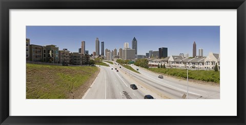 Framed Vehicles moving on the road leading towards the city, Atlanta, Georgia, USA Print