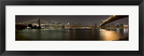 Framed Brooklyn Bridge and Manhattan Bridge across East River at night, Manhattan, New York City, New York State, USA Print