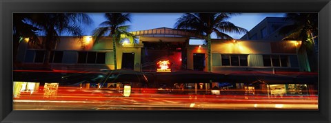 Framed Traffic in front of a building at dusk, Art Deco District, South Beach, Miami Beach, Miami-Dade County, Florida, USA Print