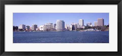 Framed Skyscrapers in a lake, Lake Merritt, Oakland, California, USA Print