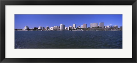 Framed Skyscrapers along a lake, Lake Merritt, Oakland, California, USA Print