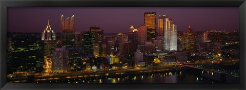 Framed High angle view of buildings lit up at night, Pittsburgh, Pennsylvania, USA Print