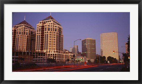 Framed USA, California, Oakland, Alameda County, New City Center, Buildings lit up at night Print