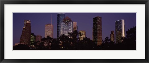 Framed Buildings in a city lit up at dusk, Houston, Harris county, Texas, USA Print