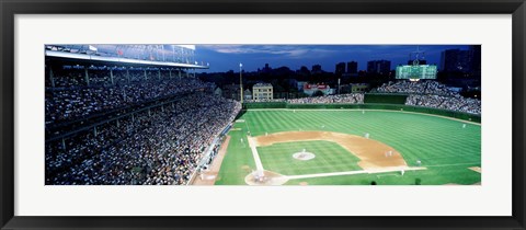 Framed Cubs baseball game under flood lights, USA, Illinois, Chicago Print