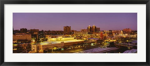 Framed High angle view of buildings lit up at dusk, Kansas City, Missouri, USA Print