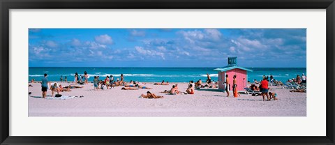 Framed Tourist on the beach, Miami, Florida, USA Print