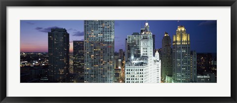 Framed Skyscraper lit up at night in a city, Chicago, Illinois, USA Print