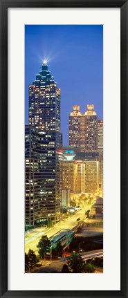 Framed Skyscrapers lit up at night, Atlanta, Georgia, USA Print