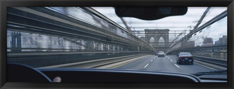 Framed Cars moving on the bridge, Brooklyn Bridge, New York City, New York State, USA Print