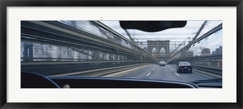 Framed Cars moving on the bridge, Brooklyn Bridge, New York City, New York State, USA Print