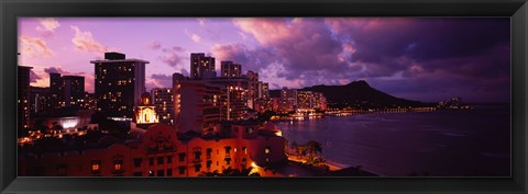 Framed Buildings lit up at dusk, Waikiki, Oahu, Hawaii, USA Print