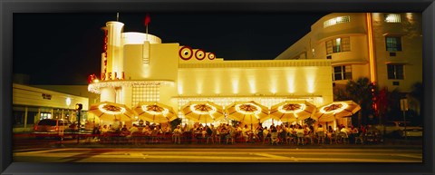 Framed Restaurant lit up at night, Miami, Florida, USA Print