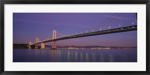 Framed Low angle view of a bridge at dusk, Oakland Bay Bridge, San Francisco, California, USA Print