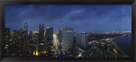 Framed High angle view of buildings in a city lit up at night, New Orleans, Louisiana, USA Print