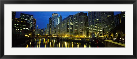 Framed Low angle view of buildings lit up at night, Chicago River, Chicago, Illinois, USA Print