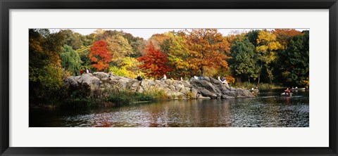 Framed Group of people sitting on rocks, Central Park, Manhattan, New York City, New York, USA Print