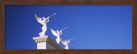 Framed Low angle view of statues on a wall, Caesars Place, Las Vegas, Nevada, USA Print