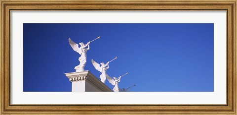 Framed Low angle view of statues on a wall, Caesars Place, Las Vegas, Nevada, USA Print