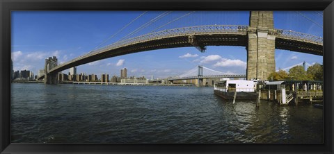 Framed Suspension bridge across a river, Brooklyn Bridge, East River, Manhattan, New York City, New York State, USA Print