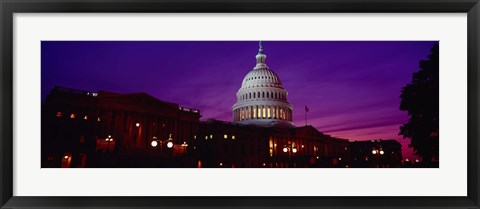 Framed Low angle view of a government building lit up at twilight, Capitol Building, Washington DC, USA Print