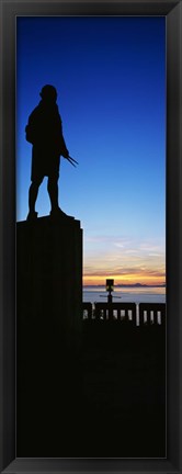 Framed Captain Cook monument silhouetted by sunset, Anchorage, Alaska, USA. Print