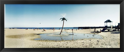 Framed Palm tree sprinkler on the beach, Coney Island, Brooklyn, New York City, New York State, USA Print