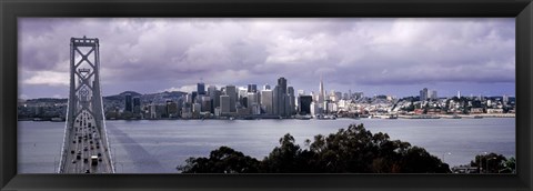 Framed Bridge across a bay with city skyline in the background, Bay Bridge, San Francisco Bay, San Francisco, California, USA Print