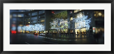 Framed Buildings lit up at the roadside, Columbus Circle, New York City, New York State, USA Print