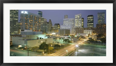 Framed Skyscrapers lit up at night, Houston, Texas Print