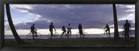 Framed Tourists cycling on the beach, Honolulu, Oahu, Hawaii, USA Print